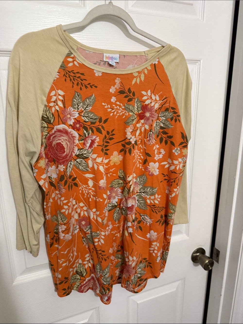 LuLaRoe Orange Floral Raglan with Cream Sleeves